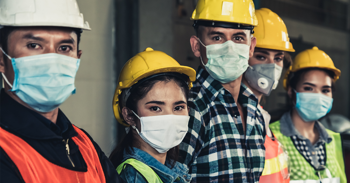 construction workers wearing masks